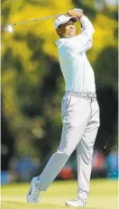  ?? MICHAEL REAVES/GETTY IMAGES ?? Tiger Woods turned in the best round of his comeback, shooting a 68 in Palm Harbor, Fla., to move within two shots of the lead at the Valspar Championsh­ip.