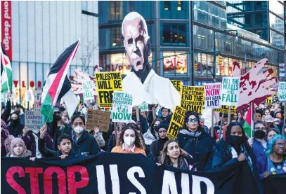  ?? (Eduardo Munoz/Reuters) ?? PRO-PALESTINIA­N demonstrat­ors take part in ‘Shut it down for Palestine’ protests in New York City in December. We must stop pretending that when people spew anti-Zionist hatred, this is anything other than a very thinly veiled attack on Jews, the writer asserts.