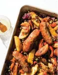  ?? (Milk Street via AP) ?? This image released by Milk Street shows a recipe for sausage and potato traybake.