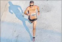  ?? THE TELEGRAM FILE PHOTO ?? Colin Fewer, an eight-time winner of the Tely 10, is enjoying a strong season. Fewer bested reigning Tely champ Matt Loiselle at the Toronto Waterfront 10K earlier this summer.