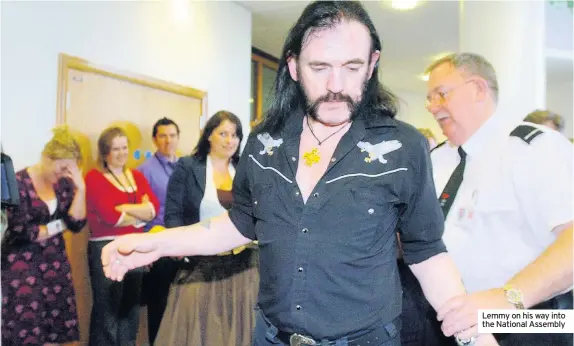  ??  ?? Lemmy on his way into the National Assembly