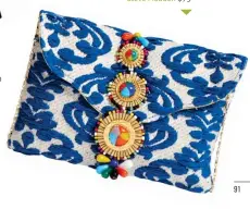  ??  ?? Fun beaded and embroidere­d clutch. Steve Madden $75