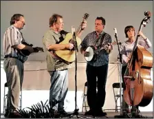  ??  ?? The Lone Mountain Band, playing Saturday at the 18th annual Linsdale Bluegrass Festival, features Bobby Burns, Roy Curry, Jim Pankey and Diana Phillips, from left.