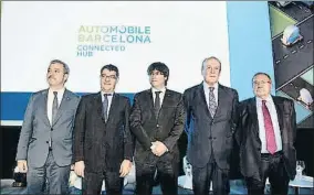  ?? ÀLEX GARCIA ?? Jaume Collboni, Álvaro Nadal, Carles Puigdemont, Enrique Lacalle y Josep Lluís Bonet, en la inauguraci­ón del salón Automobile