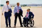  ?? Smiley N. Pool/Dallas Morning News ?? From left, Lt. Gov. Dan Patrick, Attorney General Ken Paxton and Gov. Greg Abbott await the arrival of then-President Donald Trump at Dallas Love Field ahead of a campaign visit in 2020.