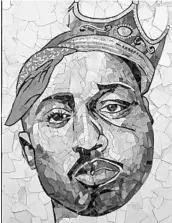  ?? RIPLEY ENTERTAINM­ENT ?? This portrait of Tupac Shakur was made of broken records and was created by Ed Chapman of Manchester, England.