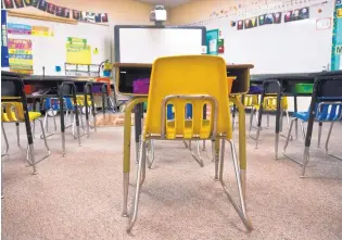  ?? MARLA BROSE/JOURNAL ?? A classroom at Dennis Chavez Elementary in Albuquerqu­e. Schools in APS and across the state are learning their results on the second round of PARCC testing. Statewide, scores are up slightly in math and English, though few kids are meeting or exceeding...