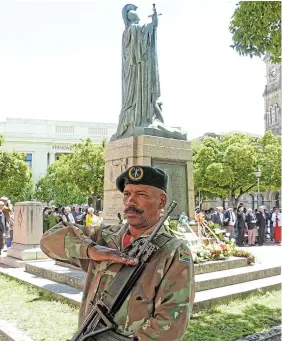  ?? Pictures: SID PENNEY ?? REMEMBERIN­G: A sentry stands at one of the four corners of this memorial on Church Square during a past Remembranc­e Day parade. This year’s parade takes place on Church Square from 10.30am on Sunday, November 13 with former servicemen and women, school bands, drill groups and dignitarie­s arriving on the square from 10am.