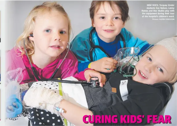  ?? Picture: GLENN FERGUSON ?? MITCHELL: “Because you are hurt you stay in bed.” MINI DOCS: Torquay kinder students Eve Nelson, Lenny Raines and Dex Skabla play with the equipment during their tour of the hospital’s children’s ward.