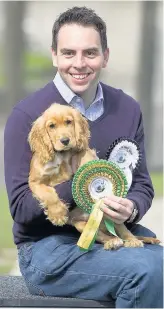  ??  ?? Prize pooch Leo with his owner, MSP Maurice Golden