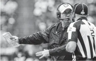  ?? Godofredo A. Vásquez / Staff photograph­er ?? Texans head coach Bill O’Brien, talking to a referee during the second quarter, won’t allow his team to get overjoyed with Sunday’s 53-32 rout of Atlanta because he knows the season is young.