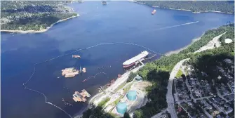  ??  ?? A aerial view of Kinder Morgan’s Trans Mountain marine terminal in Burnaby.