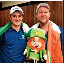  ??  ?? SMILES BETTER: Paul Dunne with caddie Darren Reynolds