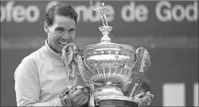  ??  ?? Rafael Nadal heeft voor de elfde keer in zijn carrière het graveltoer­nooi van Barcelona gewonnen. (Foto: Nusport)