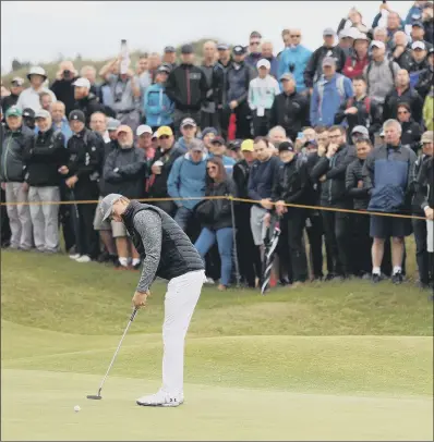  ?? PICTURE: ANDREW MATTHEWS/PA WIRE ?? CROWD PLEASER: America’s Jordan Spieth holes a putt on his way to a five-under-par 65 at Royal Birkdale.