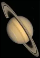  ?? COURTESY OF NASA/JET PROPULSION LABORATORY ?? This approximat­e natural-color image shows Saturn, its rings, and four of its icy satellites.