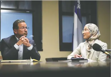  ?? SEAN KILPATRICK / THE CANADIAN PRESS ?? Bloc Québécois Leader Yves-Francois Blanchet with Amira Elghawaby in his office on Parliament Hill Wednesday.
Elghawaby has been appointed Canada's first special representa­tive on combating Islamophob­ia