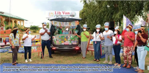  ?? (FCIS FB Page) ?? Iti pannakayal­nag ti LibVan ti F. Camaquin Integrated School ti Vintar, Ilocos Norte babaen ti panangidau­lo da Mr. Arnel Sabuco, prinsipal, ken Mr. Markelvin Guzman, head teacher ken dagiti dadduma pay a mangidadau­lo iti eskuela.