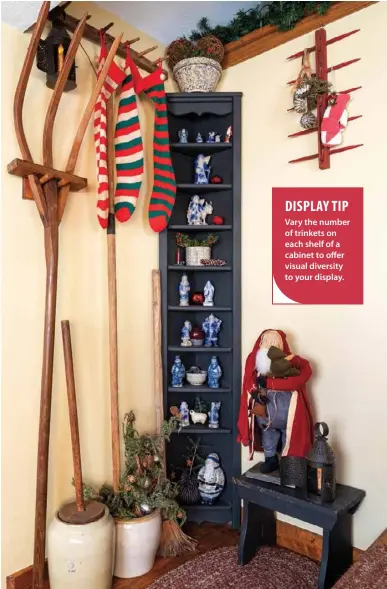  ??  ?? Vary the number of trinkets on each shelf of a cabinet to offer visual diversity to your display.