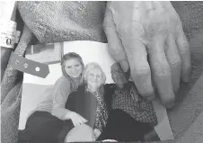  ??  ?? A photo of Hana Engel with her grandmothe­r, who died while Engel was in a coma. The photo of Engel was buried with her grandmothe­r.