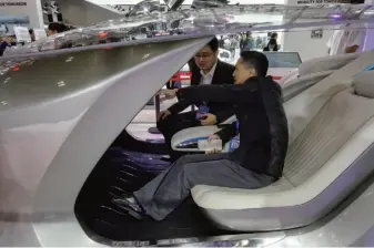  ??  ?? A display at the 2018 World Intelligen­t Connected Vehicles Conference, Beijing, November 11, 2018