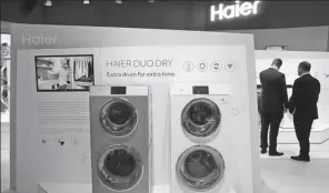  ?? REUTERS ?? Haier dual front-loading washing machines are seen at a home appliance exhibition in Berlin, Germany.
