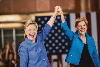  ?? Melina Mara / Washington Post ?? Hillary Clinton draws some energy from the “formidable” Sen. Elizabeth Warren, D-Mass., during a rally Monday at the Cincinnati Museum Center at Union Terminal.