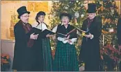  ?? FREDERIK MEIJER GARDENS & SCULPTURE PARK ?? The Original Dickens Carolers perform at the Christmas and Holiday Traditions Around the World exhibit.