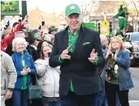  ?? The Sentinel-Record/Lance Brownfield ?? ■ Actor Christophe­r McDonald, who portrayed Shooter McGavin in “Happy Gilmore,” interacts with the crowd Friday during the First Ever 20th Annual World’s Shortest St. Patrick’s Day Parade.