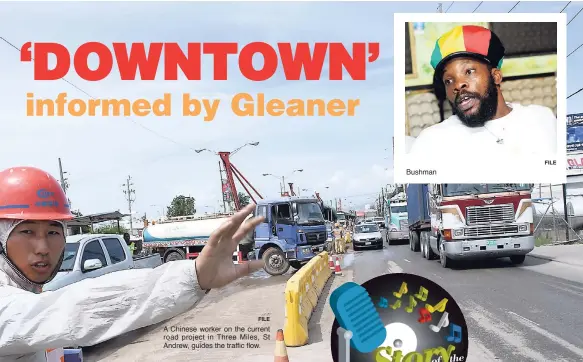  ?? FILE FILE ?? A Chinese worker on the current road project in Three Miles, St Andrew, guides the traffic flow. Bushman