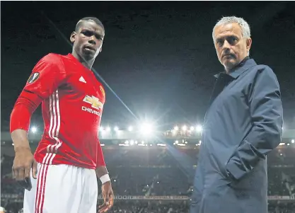  ??  ?? Manchester United manager Jose Mourinho, right, and midfielder Paul Pogba.