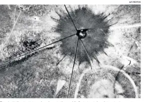  ?? AP PHOTOS ?? Above: An aerial view shows the July 16, 1945, aftermath of the first atomic explosion at the Trinity Test Site near Alamogordo, N.M.