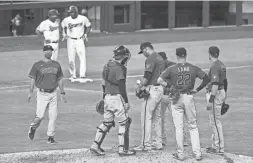  ?? AP ?? Diamondbac­ks manager Torey Lovullo walks to the mound to pull reliever Hector Rondon after he walked three and gave up two earned runs in the eighth inning against the Rangers on Wednesday in Arlington.