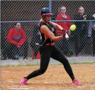  ?? BILL RUDICK — DIGITAL FIRST MEDIA ?? Coatesvill­e pitcher Bri White connects for a home run against Bishop Shanahan on Friday.