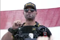  ?? AP file photo ?? Proud Boys leader Henry “Enrique” Tarrio wears a hat that says The War Boys during a rally in Portland, Ore., on Sep. 26.