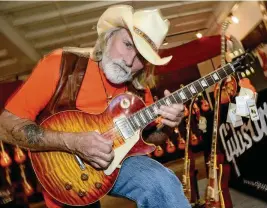  ?? RICK DIAMOND / TNS ?? Dickey Betts attends a press conference for the Gibson Custom Southern Rock Tribute 1959 Les Paul at the Gibson Guitar Factory in 2014 in Nashville. Betts, a guitarist and cofounder of the Allman Brothers Band who shared lead guitar duties with Duane Allman in the original band, died Thursday at age 80.