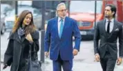  ?? AP FILE ?? Businessma­n Vijay Mallya (centre) arrives at the Westminste­r Magistrate­s Court for a hearing in London in January.