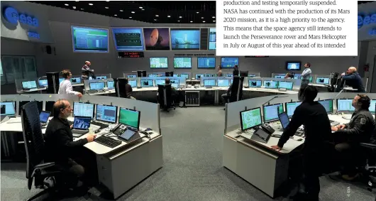  ??  ?? Right: The Main Control Room at the ESA’s Space Operations Centre communicat­es with spacecraft throughout the Solar System