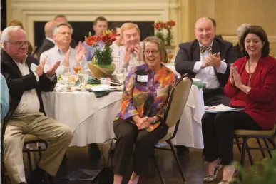  ?? Staff photo by Evan Lewis ?? n Prissy Hickerson reacts to being named the 2017 recipient of the Idalee Hawkins Leader of the Year Award on Tuesday during Leadership Texarkana’s Lunch with Leaders at Texarkana Country Club.