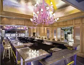  ?? SIMON HARE PHOTOGRAPH­ER The Forge ?? The Forge restaurant in Miami Beach is auctioning off everything inside, including its chandelier­s, before a total renovation.