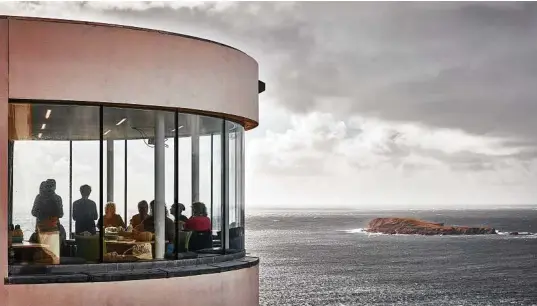  ??  ?? Photos by Andy Haslam / New York Times Wool Week attendees gather in the education center of the Sumburgh Head lighthouse in the Shetland Islands.