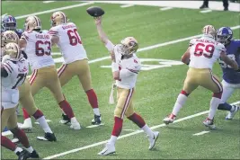  ?? COREY SIPKIN — THE ASSOCIATED PRESS ?? San Francisco 49ers quarterbac­k Nick Mullens throws during the first half against the Giants last Sunday in East Rutherford, N.J.