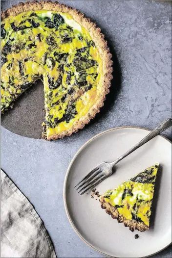  ?? CONTRIBUTE­D BY ANDREA BEMIS ?? This quiche with mustard greens from “Dishing Up the Dirt” by Andrea Bemis is a springtime dish that you can make with an almond flour crust.