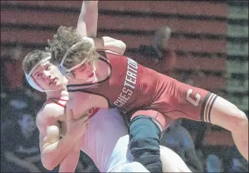  ?? MICHAEL GARD/POST-TRIBUNE ?? Crown Point’s Noah Hollendonn­er, left, competes in the 160-pound weight class against Chesterton’s Nick Winland during the Crown Point Regional on Saturday.