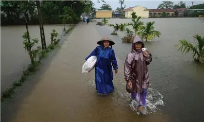  ?? Photograph: Manan Vatsyayana/AFP/Getty ?? Residents have been shocked by the scale and speed of this year’s flooding.