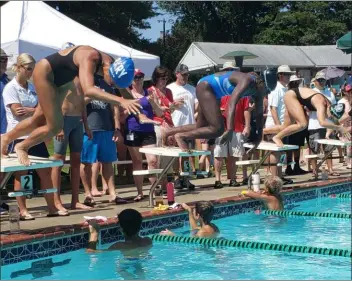  ?? SUBMITTED PHOTO ?? Lansdowne Swim Club’s Kelly Mekoue, center, takes off on the start of the 50-meter freestyle Sunday at the Delco Swim League’s Meet of Champions at Creekside Swim Club. Mekoue won the 50 free in 27.15 seconds, her third win of the day.