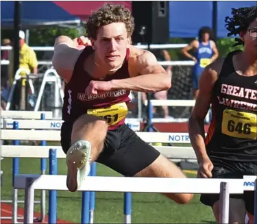  ?? STAFF PHOTO CHRIS CHRISTO/ BOSTON HERALD ?? Ean Hynes of Newburypor­t winning the 110 yd hurdles during the D4 Track and Field Tournament in Hingham.