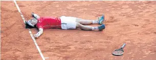  ?? EPA ?? Spain’s David Ferrer celebrates after beating German Philipp Kohlschrei­ber.