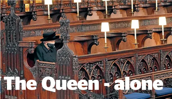  ?? AP ?? Queen Elizabeth II sits alone in St George’s Chapel during the funeral of Prince Philip, the man who had been by her side for 73 years, at Windsor Castle.
