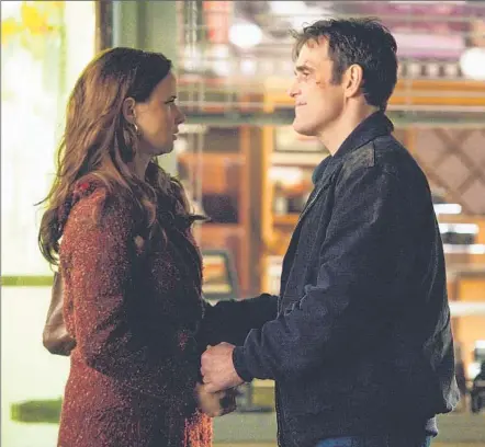  ?? Liane Hentscher Fox ?? JULIETTE LEWIS and Matt Dillon star in “Wayward Pines,” about a town in Idaho full of forced cheer and suspicious behavior.